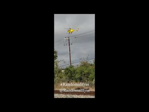 VIDEO: Sure would Not want to be that guy in the bucket! Helicopter High Voltage Cabling and lineman